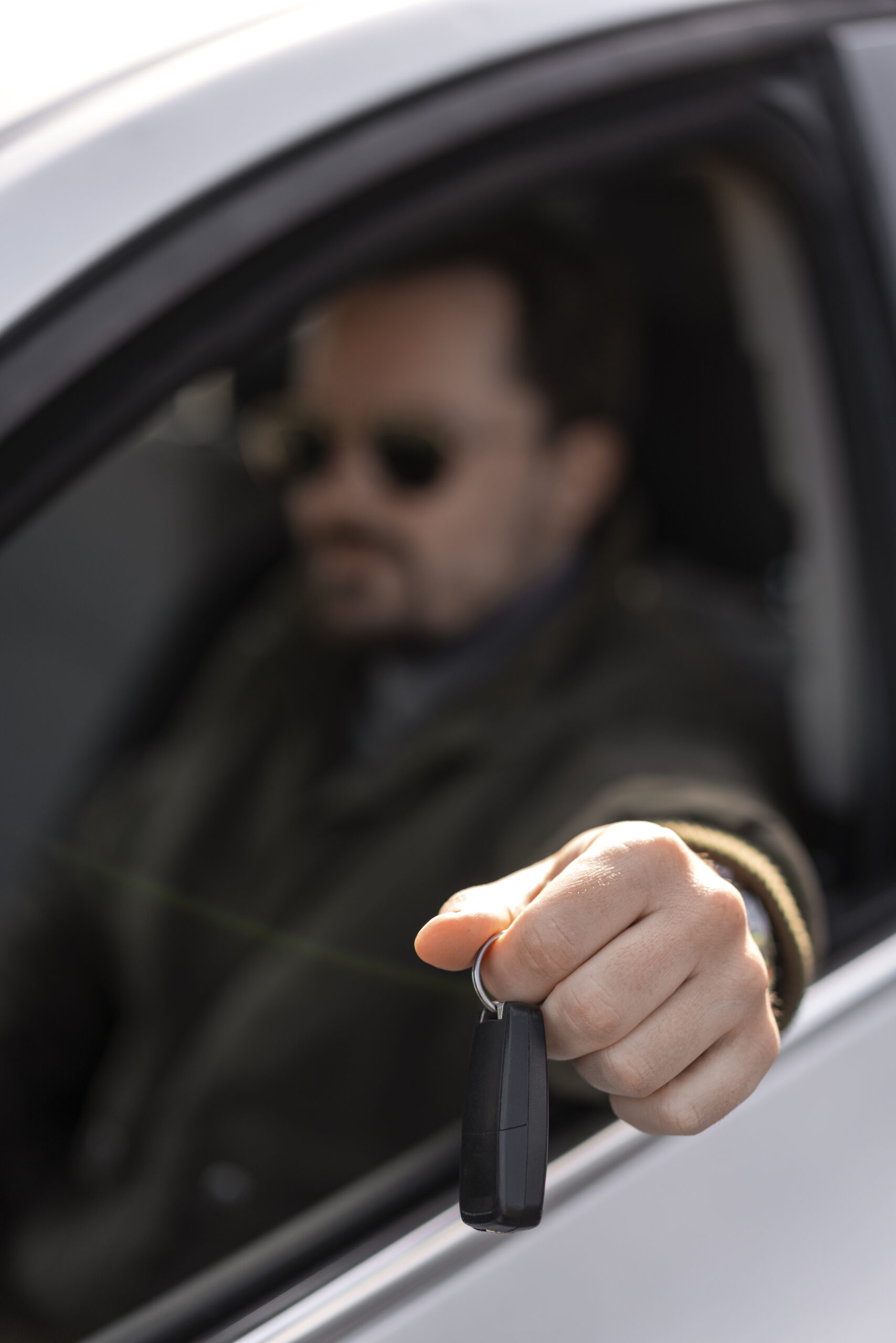 side-view-man-driving-car
